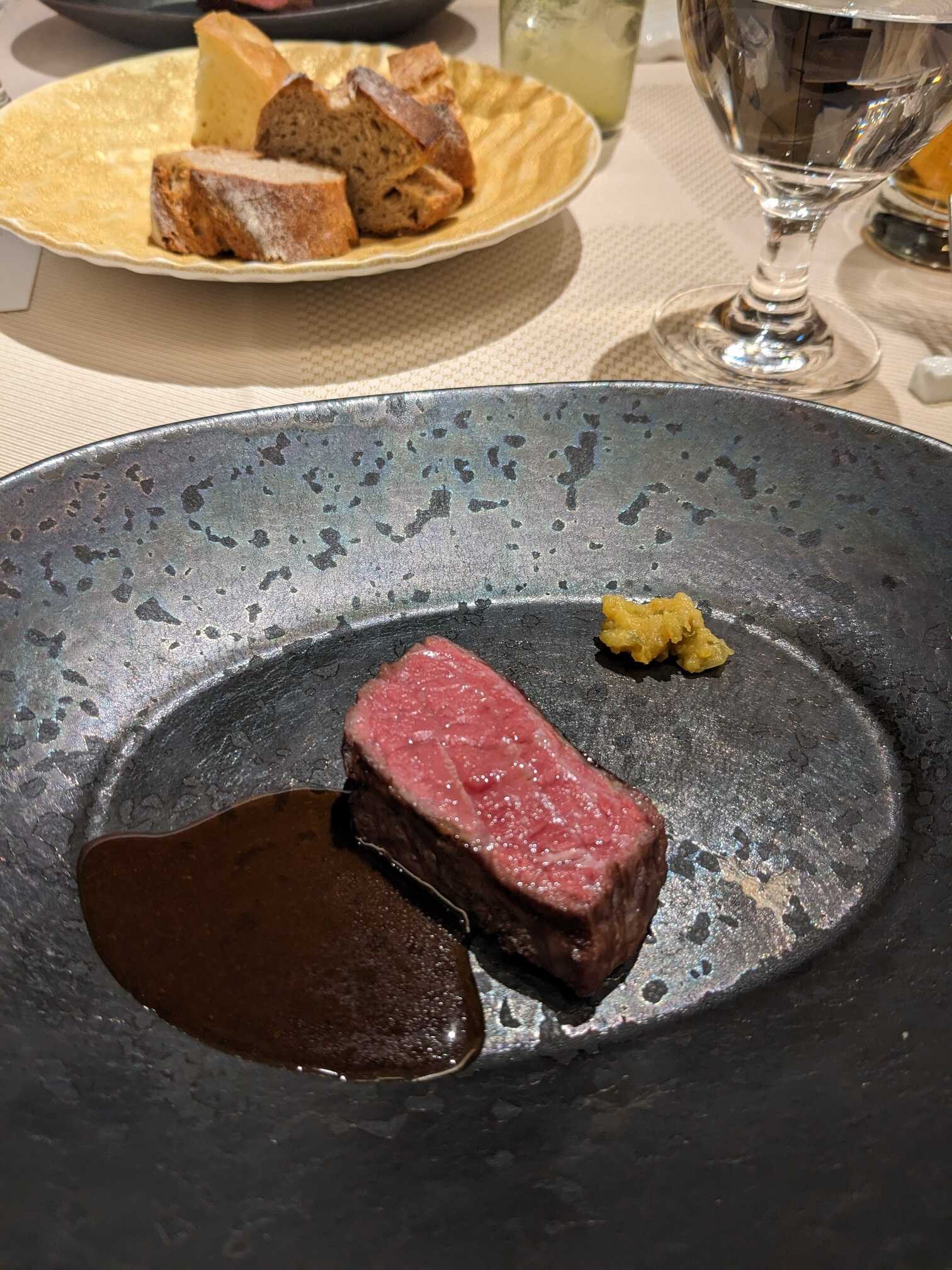Fireword grilled Hitachi beef with orange marinated green olives